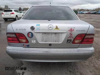 2002 Mercedes-Benz E-Class AWD with VIN WDBJF83J62X072710, listed as a Copart auction lot 54703715 with 114,435 mi miles and Clean Title. Bid and sale history available at carsss.com. Image 7.