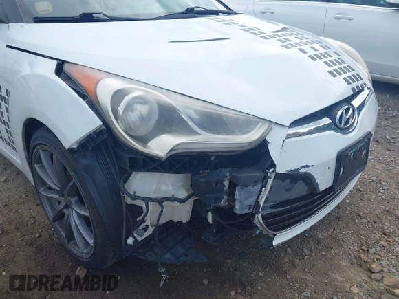 2013 Hyundai Veloster w/Gray Int z VIN KMHTC6AD3DU131703, wystawiony jako IAAI lot #42468831 z przebiegiem 188 513 mil mil oraz . Historia ofert i sprzedaży dostępna na DreamBid. Obrazek 6.