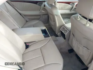 1999 Mercedes-Benz E-Class with VIN WDBJF65H1XA817789, listed as a IAAI auction lot 41818511 with 999,999 mi miles. Bid and sale history available at carsss.com. Image 8.