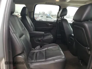 2014 Chevrolet Suburban LT with VIN 1GNSCJE07ER160935, listed as a Copart auction lot 46928335 with 123,811 mi miles and Salvage Title. Bid and sale history available at carsss.com. Image 11.