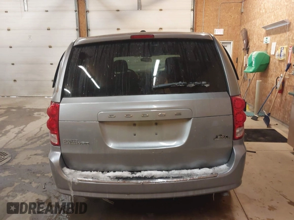 2015 Dodge Grand Caravan SE with VIN 2C4RDGBG1FR738659, listed as a IAAI auction lot 41547350 with 96,621 mi miles and . Bid and sale history available at DreamBid. Image 16.