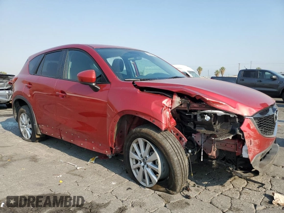 2014 Mazda CX-5 Touring with VIN JM3KE2CY0E0309845, listed as a Copart auction lot 62193734 with 97,878 mi miles and Salvage Title. Bid and sale history available at carsss.com. Image 4.