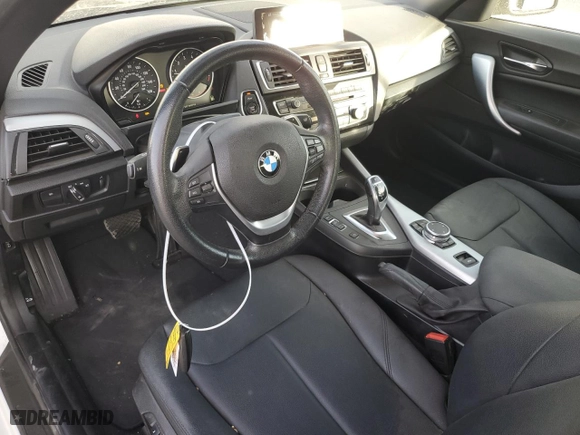 2015 BMW 2 Series 228i with VIN WBA1K5C57FV242909, listed as a Copart auction lot 77490994 with 55,099 mi miles and Salvage Title. Bid and sale history available at carsss.com. Image 8.