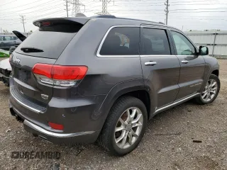 2014 Jeep Grand Cherokee Summit с VIN 1C4RJFJG6EC500348, выставлен на аукционе Copart как лот 59166275 с пробегом 104 623 миль миль и Списание • Salvage title. История ставок и продаж доступна на DreamBid. Изображение 3.