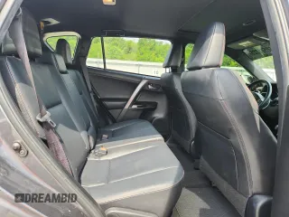 2016 Toyota RAV4 SE z VIN JTMJFREV0GD177498, wystawiony jako Copart lot #60571225 z przebiegiem 88 396 mil mil oraz Szkoda całkowita • Salvage title. Historia ofert i sprzedaży dostępna na DreamBid. Obrazek 11.