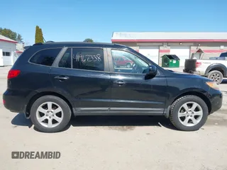 2009 Hyundai Santa Fe SE with VIN 5NMSH73EX9H287717, listed as a IAAI auction lot 41967338 with 179,859 mi miles and . Bid and sale history available at DreamBid. Image 14.