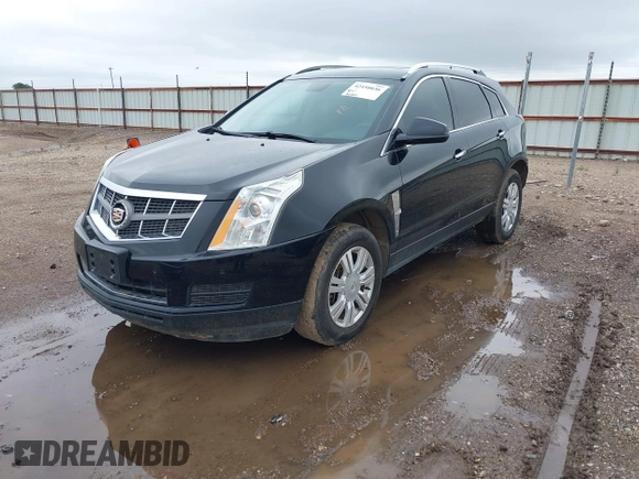 2011 Cadillac SRX Luxury Collection z VIN 3GYFNAEY7BS622584, wystawiony jako IAAI lot #42450036 z przebiegiem 140 250 mil mil oraz . Historia ofert i sprzedaży dostępna na DreamBid. Obrazek 2.