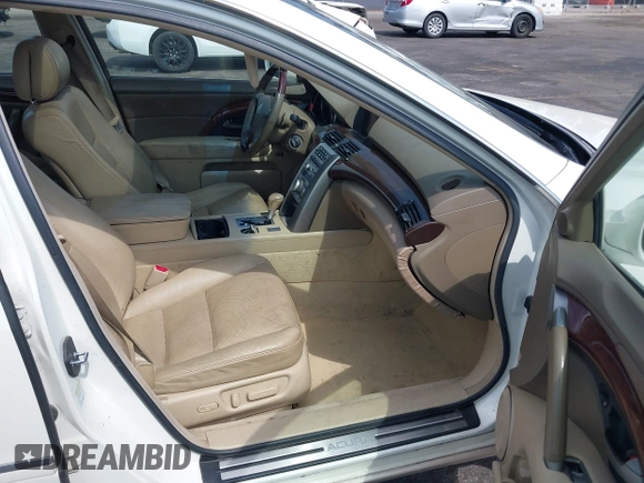 2005 Acura RL with VIN JH4KB16565C018356, listed as a IAAI auction lot 42138971 with 186,437 mi miles and . Bid and sale history available at DreamBid. Image 5.