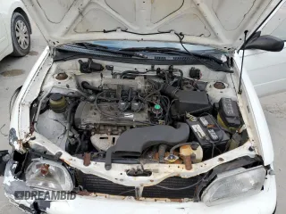 1996 Toyota Tercel DX z VIN JT2AC52L5T0158041, wystawiony jako Copart lot #80121114 z przebiegiem 35 691 mil mil oraz Szkoda całkowita • Salvage title. Historia ofert i sprzedaży dostępna na DreamBid. Obrazek 11.