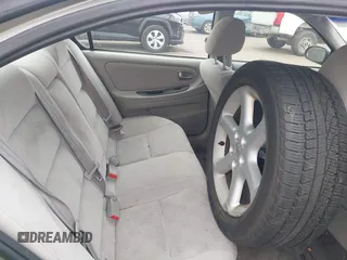 2003 Nissan Maxima SE with VIN JN1DA31DX3T521797, listed as a IAAI auction lot 42737605 with 150,045 mi miles and . Bid and sale history available at DreamBid. Image 8.