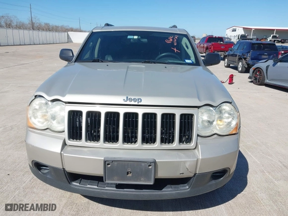 2010 Jeep Grand Cherokee Laredo with VIN 1J4PS4GK1AC111965, listed as a IAAI auction lot 41776362 with 209,042 mi miles. Bid and sale history available at carsss.com. Image 6.