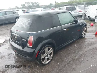 2006 MINI Convertible S with VIN WMWRH33516TF86823, listed as a IAAI auction lot 42184059 with Not Provided miles and . Bid and sale history available at DreamBid. Image 4.