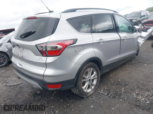 2017 Ford Escape SE with VIN 1FMCU0G97HUA46463, listed as a IAAI auction lot 41989263 with 130,168 mi miles and . Bid and sale history available at DreamBid. Image 4.