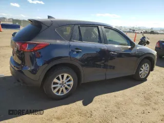 2016 Mazda CX-5 Sport with VIN JM3KE4BY4G0734582, listed as a Copart auction lot 55908515 with 52,323 mi miles and Salvage title. Bid and sale history available at DreamBid. Image 3.