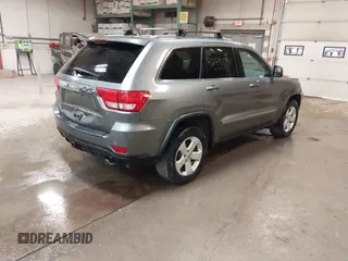 2011 Jeep Grand Cherokee Laredo with VIN 1J4RR4GG7BC578079, listed as a IAAI auction lot 42491750 with 197,581 mi miles and . Bid and sale history available at DreamBid. Image 4.