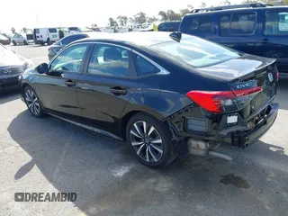 2023 Honda Civic Sedan EX with VIN 2HGFE1F75PH324493, listed as a IAAI auction lot 41692213 with 14,026 mi miles. Bid and sale history available at carsss.com. Image 3.