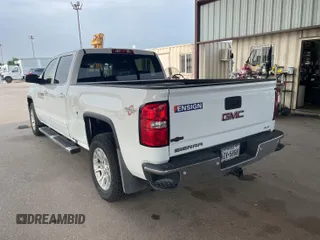 2018 GMC Sierra 1500 SLE z VIN 3GTU2MEC1JG453014, wystawiony jako IAAI lot #42564695 z przebiegiem 102 292 mil mil oraz . Historia ofert i sprzedaży dostępna na DreamBid. Obrazek 1.