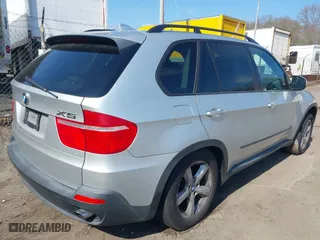 2009 BMW X5 30i with VIN 5UXFE435X9L272544, listed as a IAAI auction lot 42017376 with 118,793 mi miles. Bid and sale history available at carsss.com. Image 4.