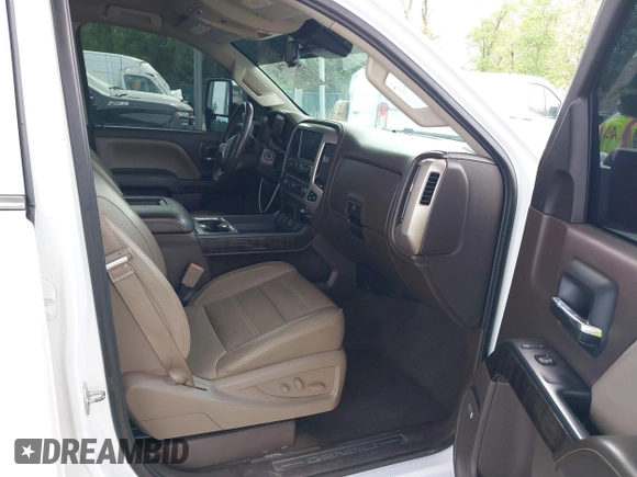 2016 GMC Sierra 2500HD Denali with VIN 1GT12UE86GF267431, listed as a IAAI auction lot 42091770 with 128,525 mi miles and . Bid and sale history available at DreamBid. Image 5.