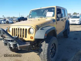 2013 Jeep Wrangler Unlimited Rubicon with VIN 1C4BJWFG3DL632668, listed as a IAAI auction lot 41751546 with 153,149 mi miles. Bid and sale history available at carsss.com. Image 6.