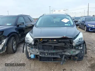 2017 Ford Escape Titanium z VIN 1FMCU0JD9HUE03672, wystawiony jako IAAI lot #42411549 z przebiegiem 89 846 mil mil oraz . Historia ofert i sprzedaży dostępna na DreamBid. Obrazek 12.