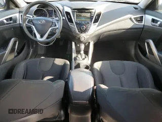 2012 Hyundai Veloster w/Gray Int z VIN KMHTC6AD1CU066882, wystawiony jako Copart lot #55781745 z przebiegiem 167 427 mil mil oraz Czysty tytuł • Clean title. Historia ofert i sprzedaży dostępna na DreamBid. Obrazek 8.