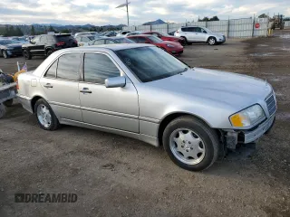2000 Mercedes-Benz C 230 Kompressor with VIN WDBHA24GXYA802790, listed as a Copart auction lot 87460324 with 156,593 mi miles and Salvage Title. Bid and sale history available at carsss.com. Image 4.