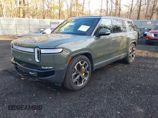 2022 Rivian R1S Launch Edition with VIN 7PDSGABL4NN000409, listed as a IAAI auction lot 41433164 with 39,603 mi miles. Bid and sale history available at carsss.com. Image 19.