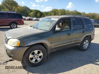 2002 Mazda Tribute LX with VIN 4F2YU09122KM62196, listed as a Copart auction lot 77327034 with 256,385 mi miles and Salvage Title. Bid and sale history available at carsss.com. Image 1.