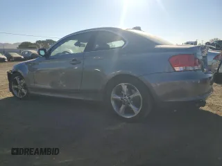2010 BMW 1 Series 128i with VIN WBAUP9C54AVL89302, listed as a Copart auction lot 76716114 with 65,882 mi miles and Salvage Title. Bid and sale history available at DreamBid. Image 2.