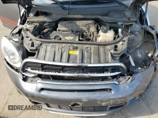 2016 MINI Countryman S z VIN WMWZC5C5XGWU21117, wystawiony jako Copart lot #65241505 z przebiegiem Nie podano mil oraz Szkoda całkowita • Salvage title. Historia ofert i sprzedaży dostępna na DreamBid. Obrazek 11.