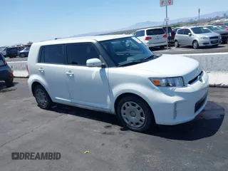 2014 Scion xB with VIN JTLZE4FE8EJ060455, listed as a IAAI auction lot 42114398 with 1 mi miles. Bid and sale history available at carsss.com. Image 6.
