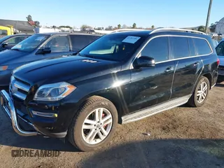 2014 Mercedes-Benz GL-Class GL 450 with VIN 4JGDF7CE3EA405380, listed as a IAAI auction lot 41383386 with 112,024 mi miles. Bid and sale history available at carsss.com. Image 2.