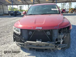 2014 Jeep Grand Cherokee Laredo with VIN 1C4RJEAG7EC274573, listed as a Copart auction lot 52637255 with 156,409 mi miles and Salvage Title. Bid and sale history available at DreamBid. Image 5.