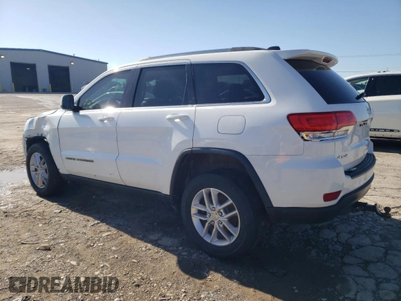 2018 Jeep Grand Cherokee Altitude with VIN 1C4RJFAG2JC258264, listed as a Copart auction lot 55262915 with 102,633 mi miles and Salvage title. Bid and sale history available at DreamBid. Image 2.