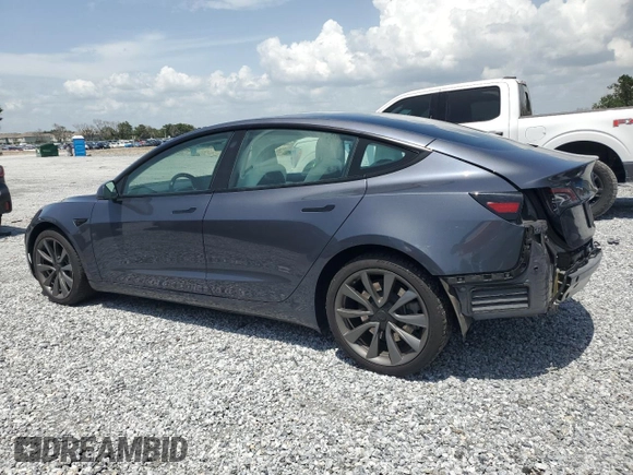 2023 Tesla Model 3 z VIN 5YJ3E1EA0PF571943, wystawiony jako Copart lot #58338235 z przebiegiem 41 584 mil mil oraz Szkoda całkowita • Salvage title. Historia ofert i sprzedaży dostępna na DreamBid. Obrazek 2.