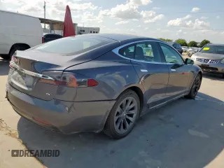 2018 Tesla Model S 75D с VIN 5YJSA1E21JF260383, выставлен на аукционе Copart как лот 61927665 с пробегом 74 644 миль миль и Списание • Salvage title. История ставок и продаж доступна на DreamBid. Изображение 3.