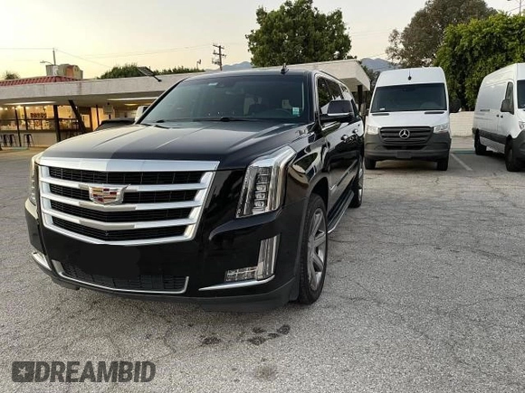 2018 Cadillac Escalade ESV Luxury z VIN 1GYS3HKJ2JR139302, wystawiony jako Copart lot #74639524 z przebiegiem 154 097 mil mil oraz Czysty tytuł • Clean title. Historia ofert i sprzedaży dostępna na DreamBid. Obrazek 2.