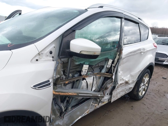 2016 Ford Escape Titanium with VIN 1FMCU9JX9GUA62674, listed as a IAAI auction lot 41838996 with 135,105 mi miles. Bid and sale history available at carsss.com. Image 6.