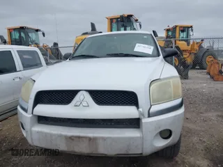 2006 Mitsubishi Raider LS with VIN 1Z7HT28K96S540590, listed as a IAAI auction lot 41746268 with 170,744 mi miles. Bid and sale history available at carsss.com. Image 6.