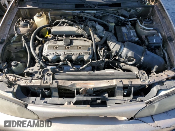 1997 Ford Escort LX with VIN 1FALP13P0VW403591, listed as a Copart auction lot 74321544 with 134,706 mi miles and Salvage Title. Bid and sale history available at DreamBid. Image 11.
