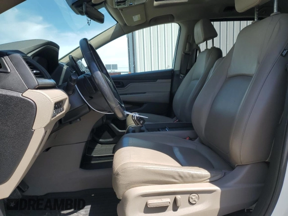 2018 Honda Odyssey Touring with VIN 5FNRL6H8XJB018438, listed as a Copart auction lot 61876505 with 104,581 mi miles and Salvage title. Bid and sale history available at DreamBid. Image 7.