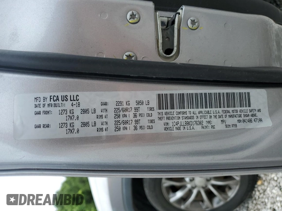 2019 Jeep Cherokee Latitude Plus with VIN 1C4PJLLB8KD176302, listed as a Copart auction lot 58181595 with 175,661 mi miles and Salvage title. Bid and sale history available at DreamBid. Image 12.