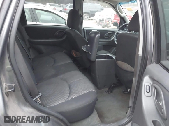 2006 Mazda Tribute S with VIN 4F2YZ04196KM12510, listed as a IAAI auction lot 41382627 with 242,650 mi miles and . Bid and sale history available at DreamBid. Image 8.