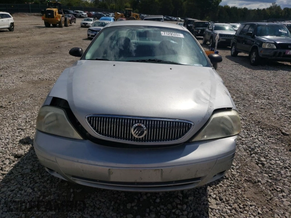 2004 Mercury Sable GS z VIN 1MEFM50UX4A619346, wystawiony jako Copart lot #71295284 z przebiegiem 71 883 mil mil oraz Szkoda całkowita • Salvage title. Historia ofert i sprzedaży dostępna na DreamBid. Obrazek 5.