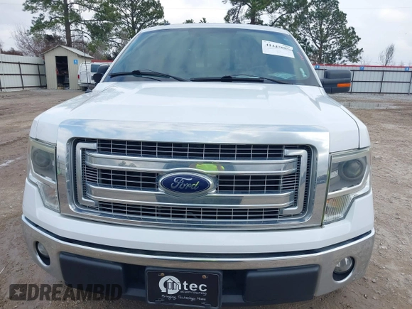 2014 Ford F-150 XL with VIN 1FTFW1CF9EKD01702, listed as a IAAI auction lot 41447899 with 185,247 mi miles. Bid and sale history available at carsss.com. Image 12.