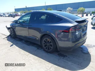 2022 Tesla Model X with VIN 7SAXCAE59NF360301, listed as a IAAI auction lot 41945059 with Not Provided miles and . Bid and sale history available at DreamBid. Image 3.