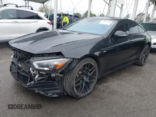 2022 Mercedes-Benz AMG GT 43 z VIN W1K7X5KB7NA048401, wystawiony jako IAAI lot #41805470 z przebiegiem 118 033 mil mil oraz . Historia ofert i sprzedaży dostępna na DreamBid. Obrazek 2.