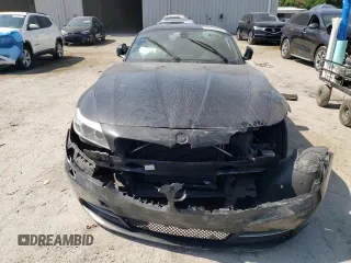 2015 BMW Z4 sDrive28i z VIN WBALL5C51FP557408, wystawiony jako Copart lot #55568525 z przebiegiem Nie podano mil oraz Szkoda całkowita • Salvage title. Historia ofert i sprzedaży dostępna na DreamBid. Obrazek 5.