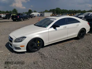 2014 Mercedes-Benz CLS-Class CLS 550 with VIN WDDLJ9BB9EA117290, listed as a Copart auction lot 68517414 with 98,705 mi miles and Salvage Title. Bid and sale history available at carsss.com. Image 1.
